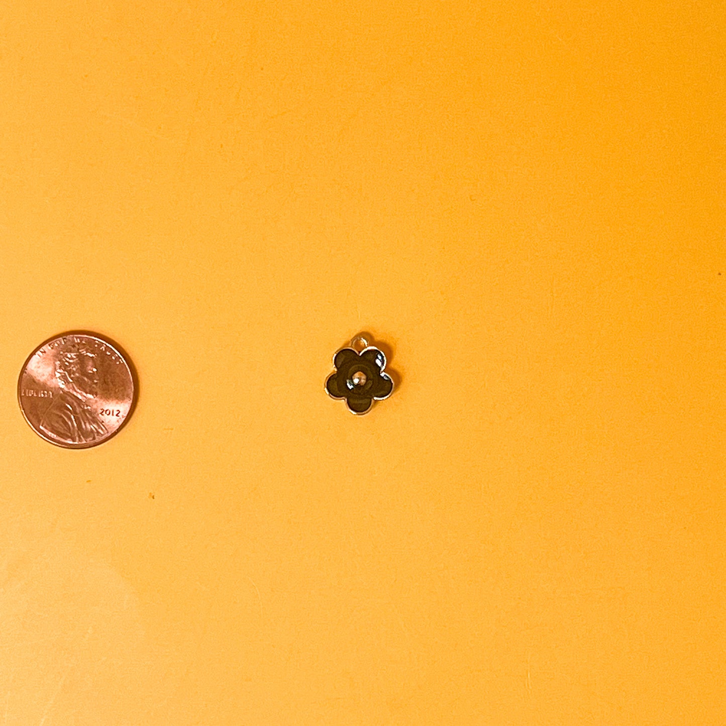 Black Daisy Charm