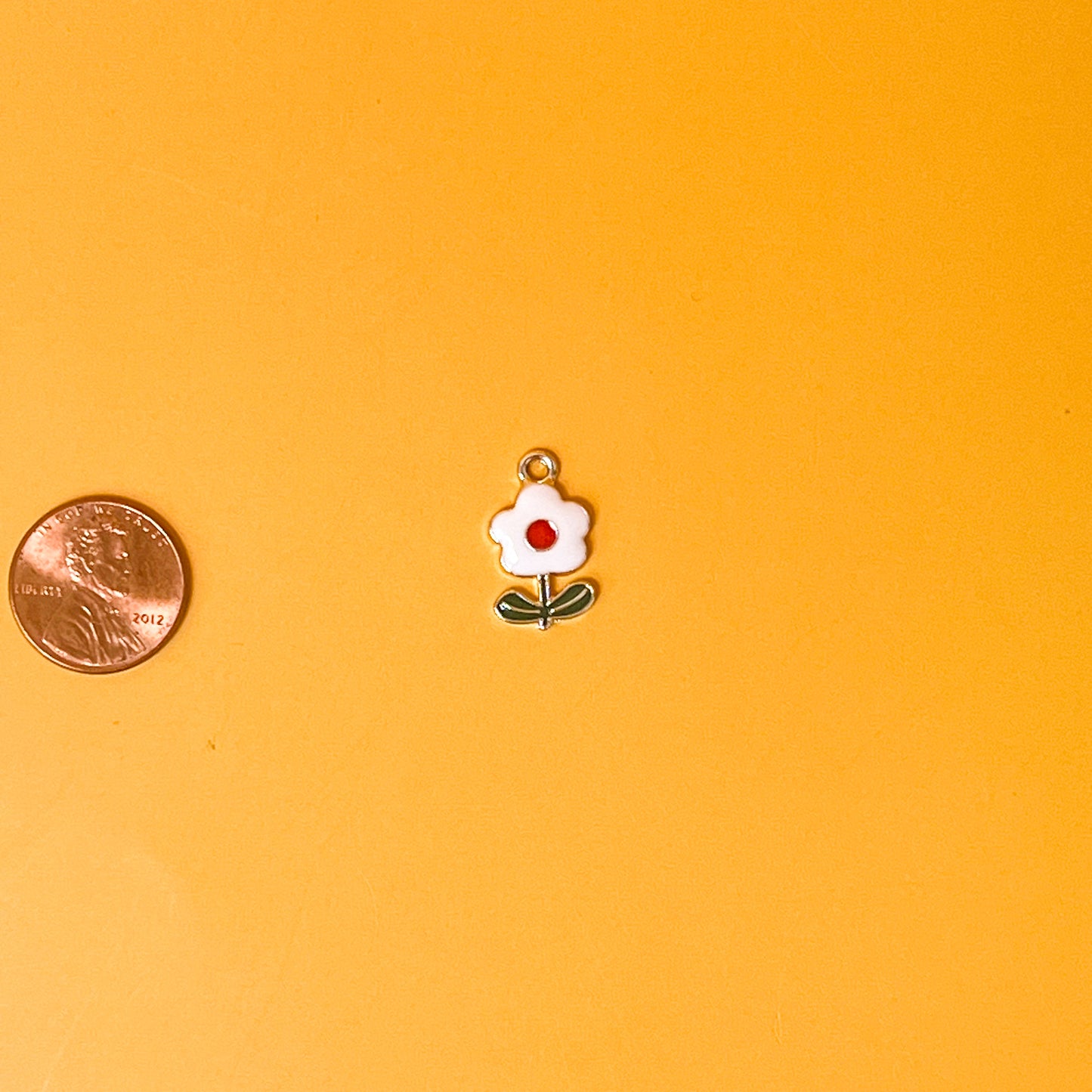 White and Red Flower Charm